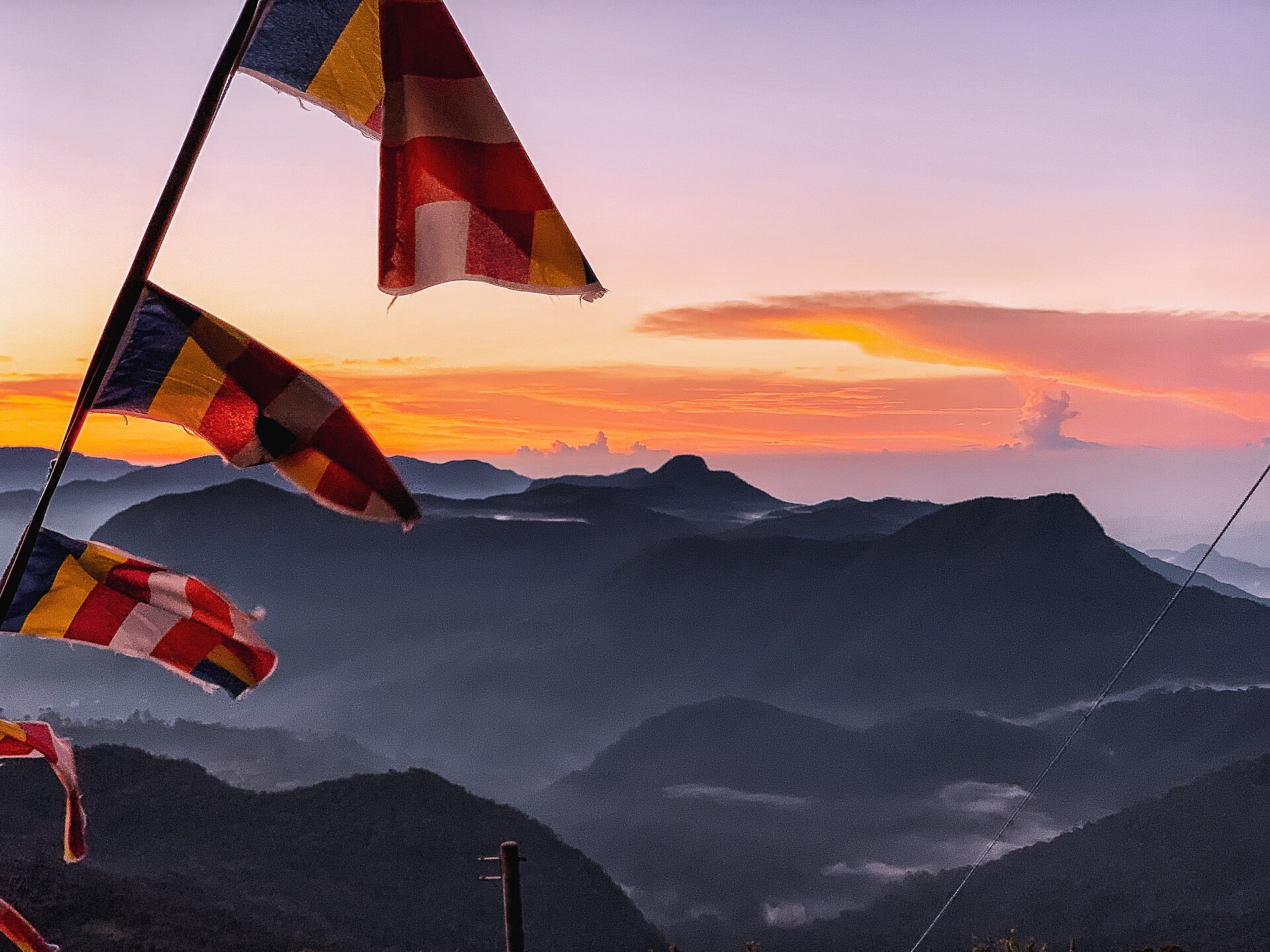 Sunrise from the summit of Sri Pada (Adam's Peak) in Sri Lanka, reached via the long Rathnapura pilgrim trail through the Peak Wilderness Sanctuary