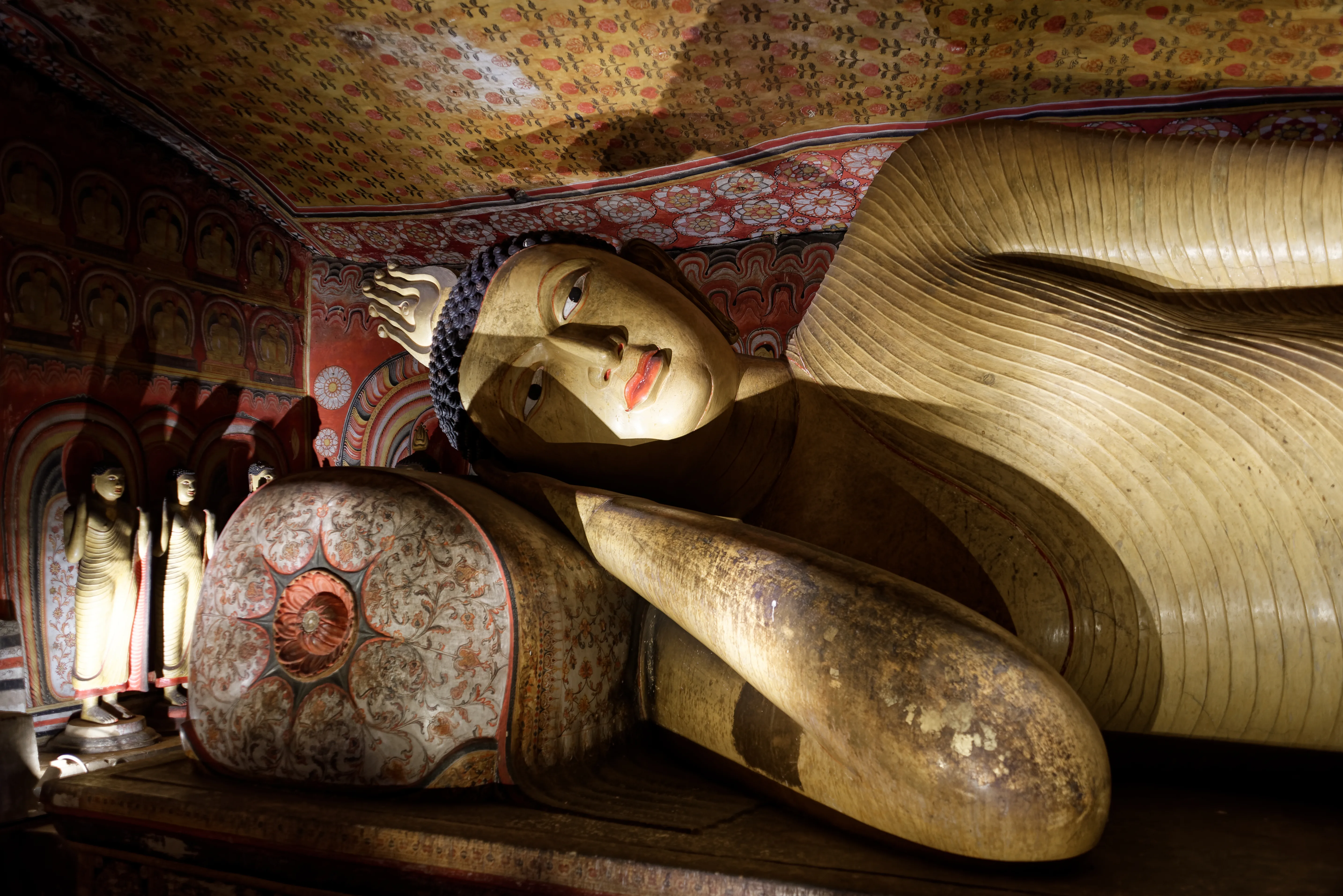 Reclining Buddha statue inside the Dambulla Cave Temple, Sri Lanka