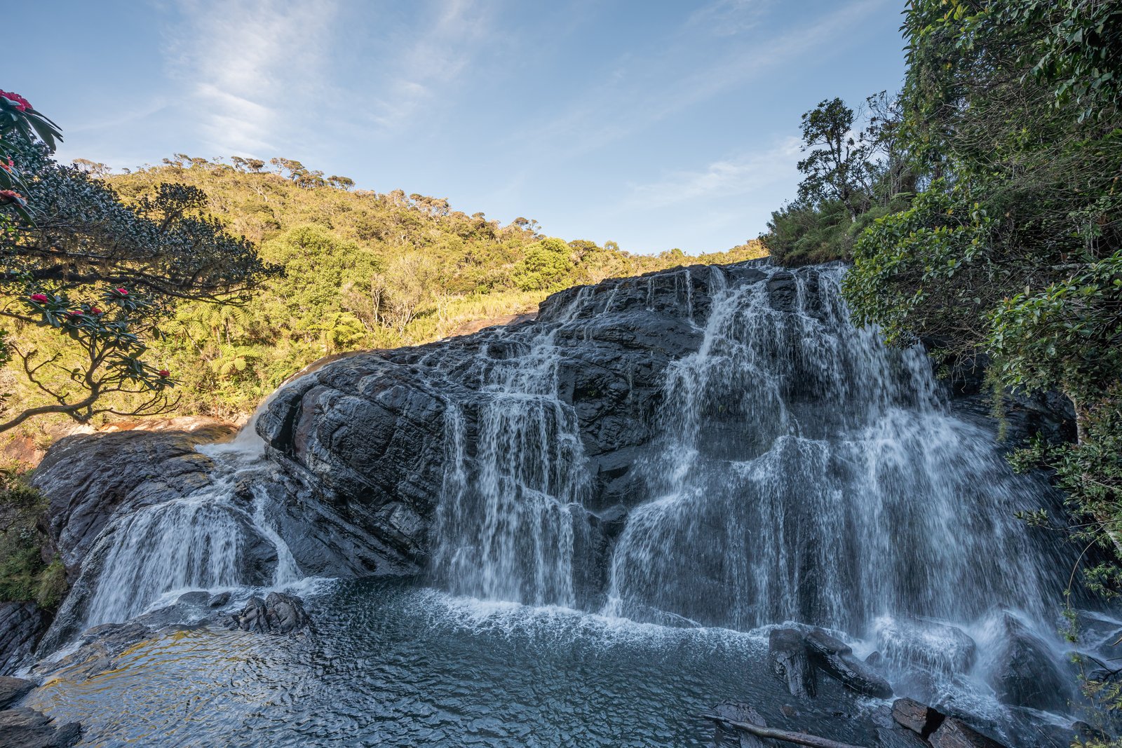 Baker&rsquo;s Falls on the Horton Plains loop &mdash; the shaded waterfall half-way round the 9 km circuit
