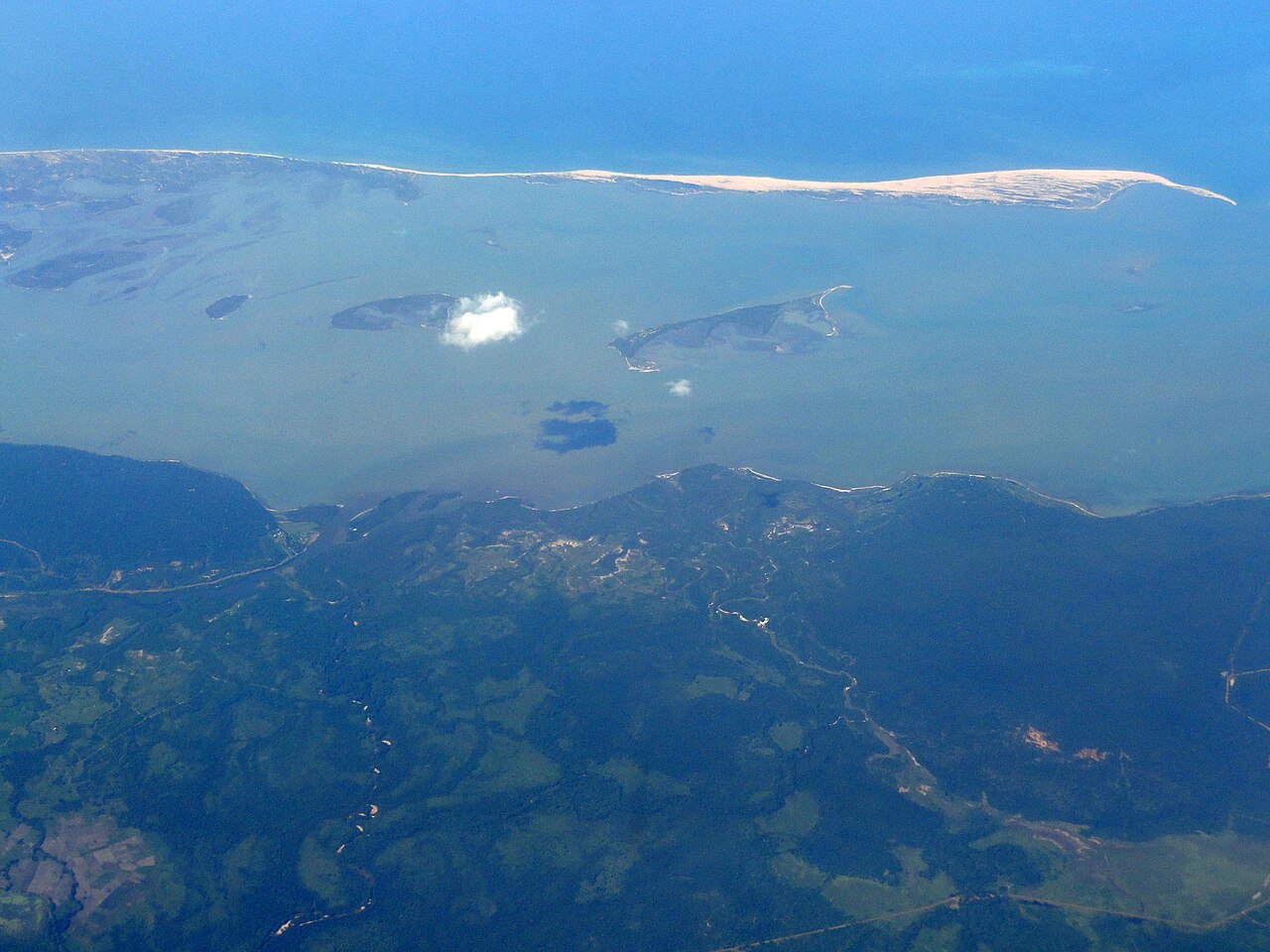 The Kalpitiya peninsula and Puttalam Lagoon seen from above, with mainland Sri Lanka in the foreground and the sandbar islands offshore