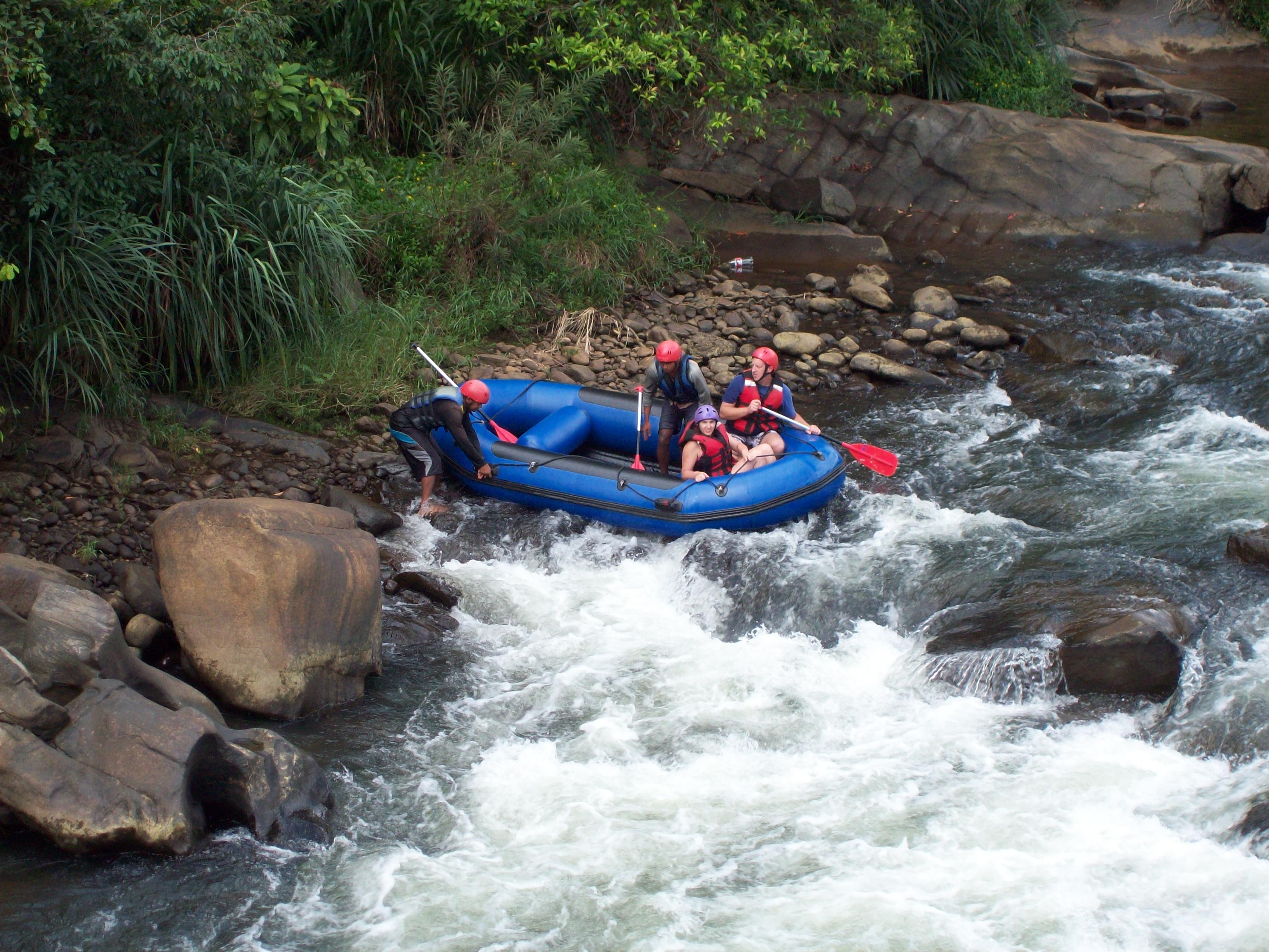 White water rafting on the Kelani River through rainforest at Kitulgala, Sri Lanka