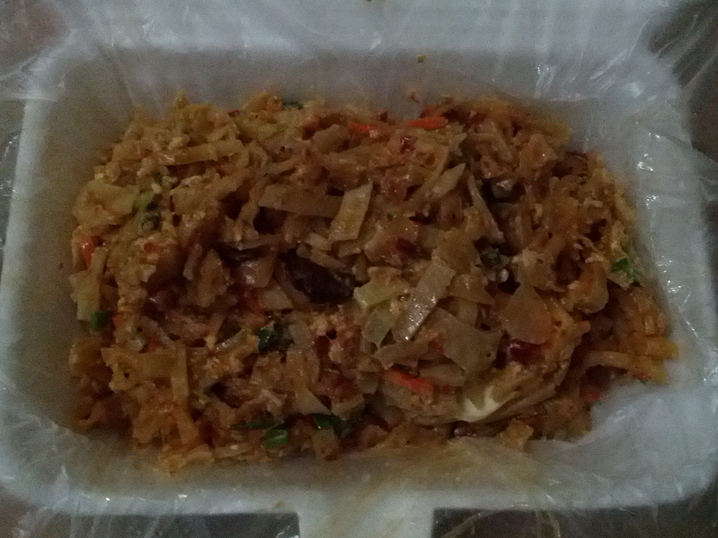 Kottu roti being chopped on a hot griddle, a classic Sri Lankan street food dish