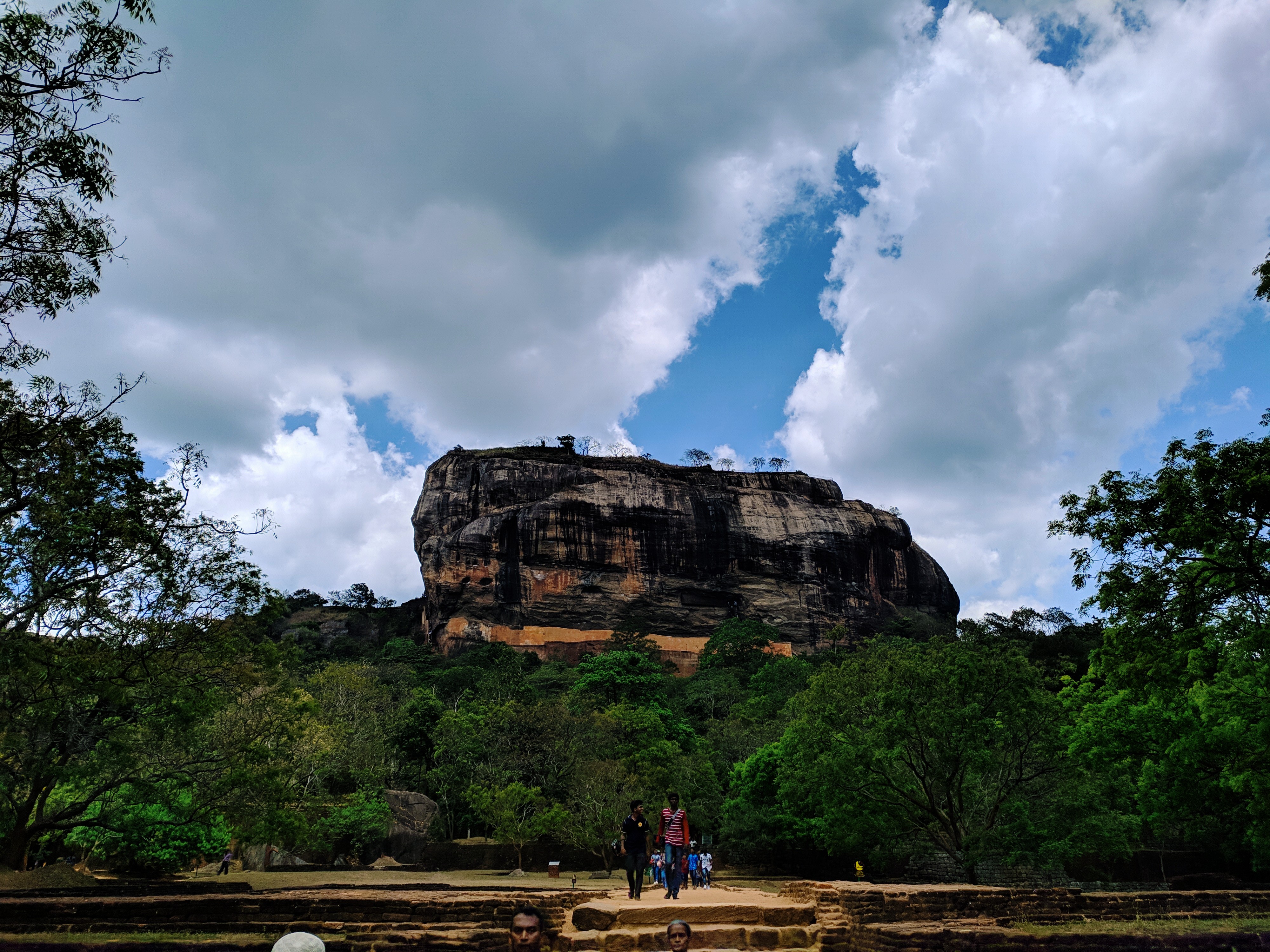 Sigiriya Rock Fortress rising above lush green forest, Cultural Triangle Sri Lanka