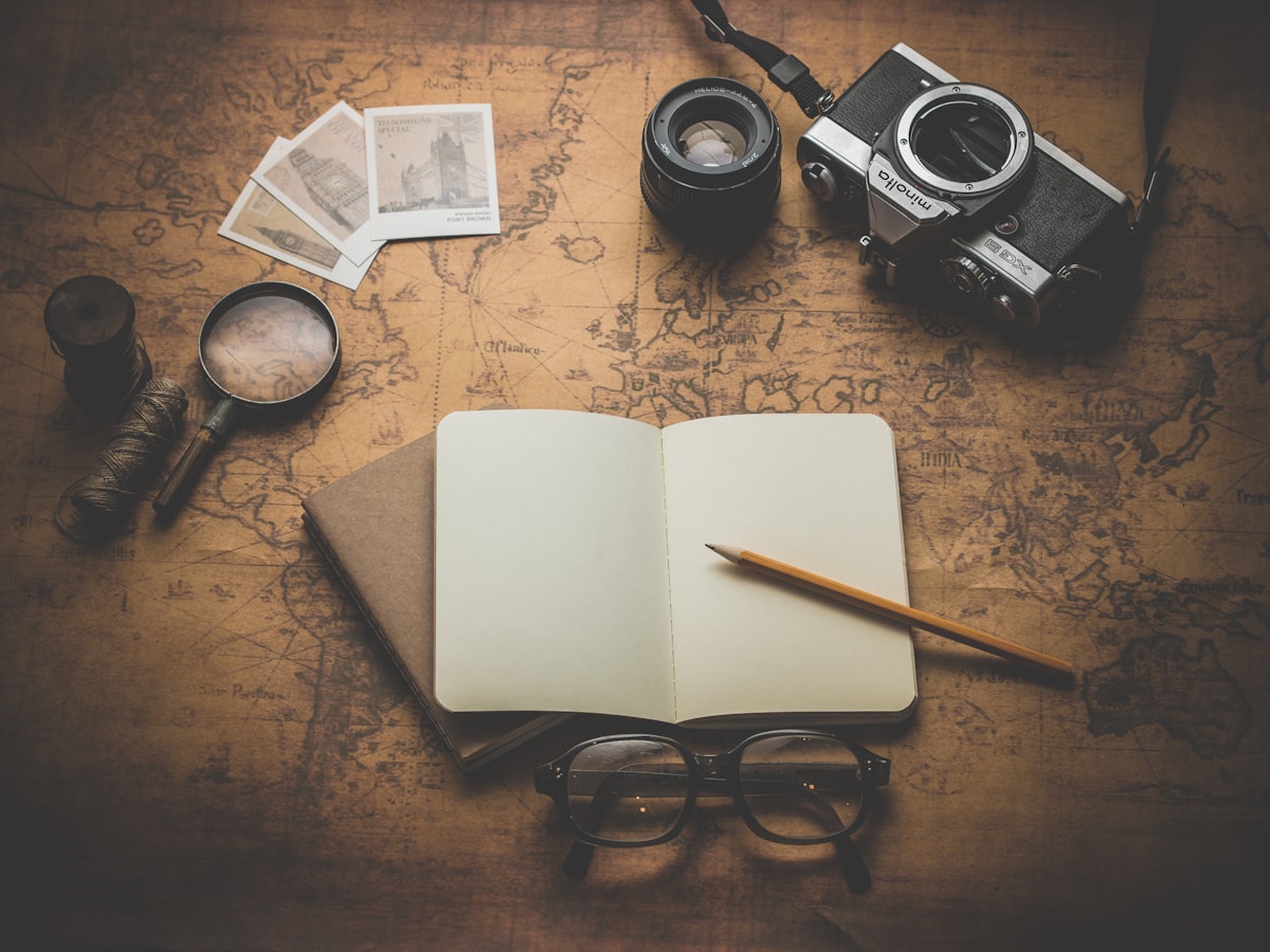 Travel documents and passport on a world map, representing international travel and visa applications