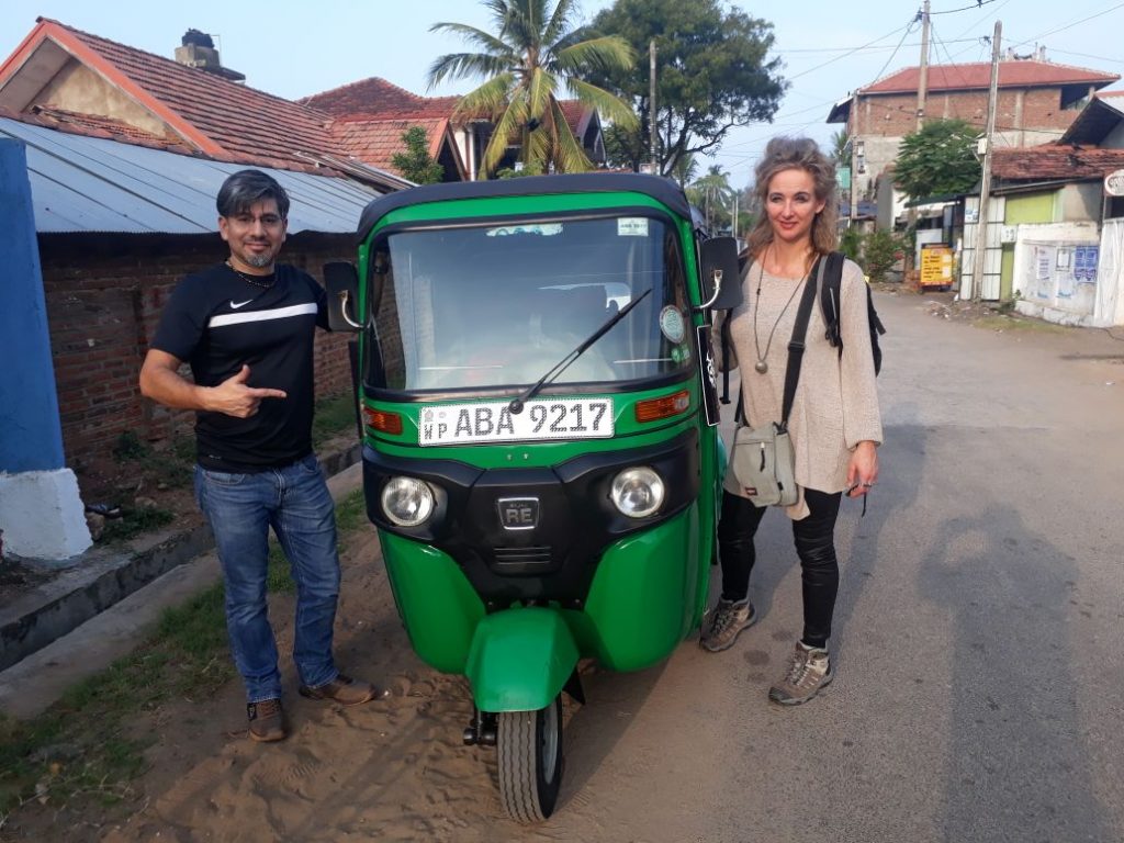A tuk-tuk on a Sri Lankan road — for short hops a trusted local driver or app fare is often the smarter booking than a multi-day private hire