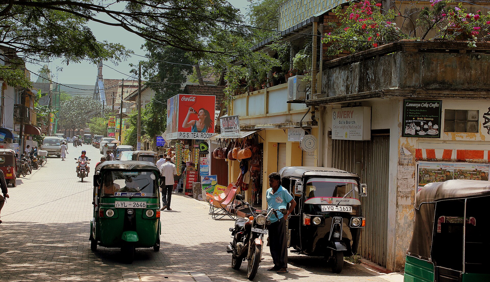 Tuk-tuks lined up at Galle, a tourist hub where first quotes often run well above the app rate